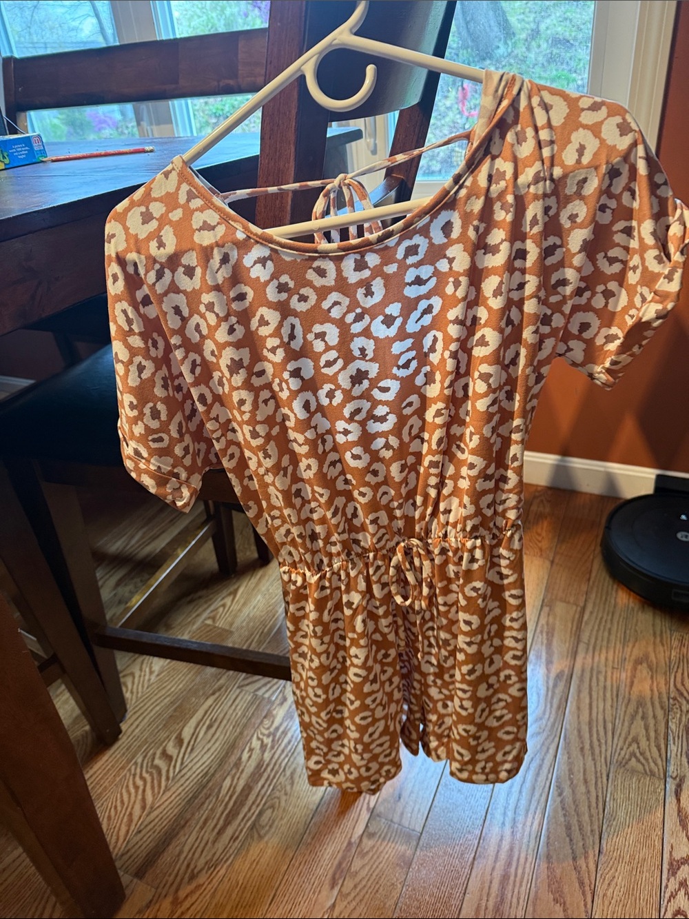 ROMPER! New no tags “Noflik” Women's Rust Animal Print Short Sleeve Romper!